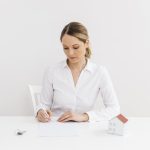 businesswoman signing document contract sale new house 150x150